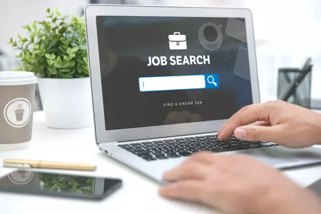 Image of a laptop with a search engine pulled up titled "Job search"